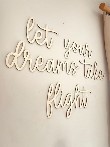 Let your dreams take flight sign